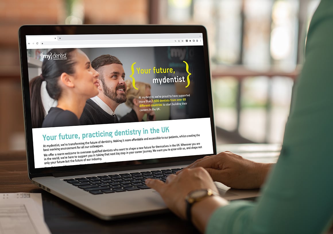 Person typing on laptop