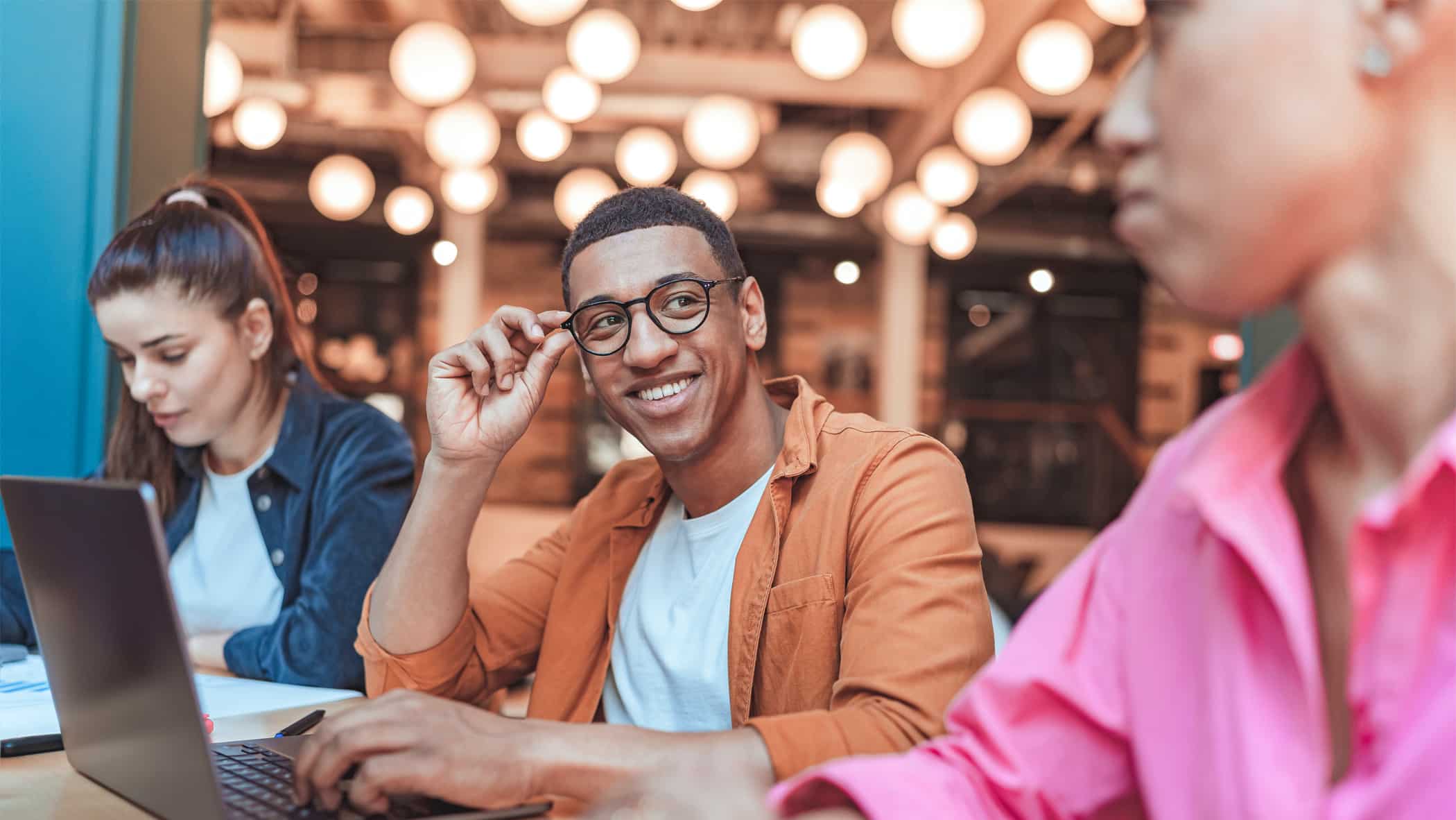 A group of colleagues sitting around a table